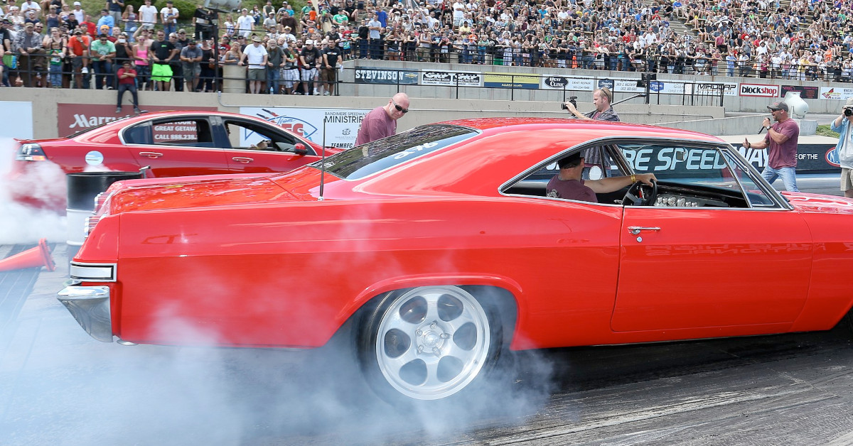 Drag Racing - Source https://commons.wikimedia.org/wiki/File:USATrip-Day15_BandimereKBPIRocknRollShow_24.8.2014_SW190.jpg